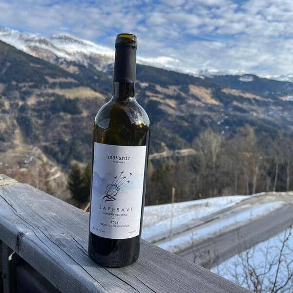 A bottle of Saperavi semi-dry 2021 in the Swiss mountains